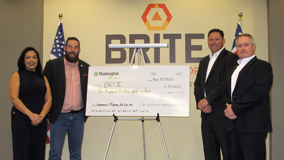 BRITE receiving a $10,000 check from Huntington bank