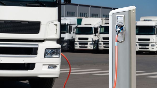 A truck being charged at an EV charger