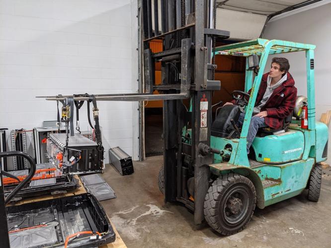 Augie Chico, a BRITE startup founder, driving a forklift