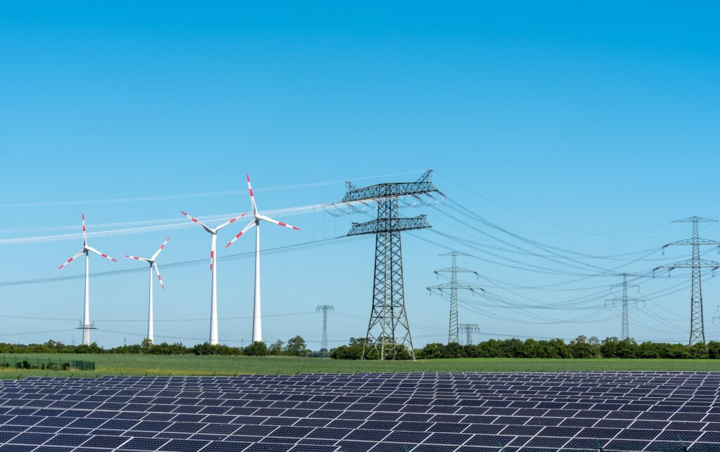 Solar energy panels, wind power and electricity pylons