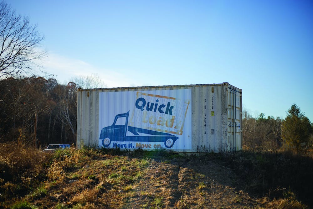 QuickLoadz's logo displayed on a shipping container that sits at the entrance of QuickLoadz Container System on Industrial Park Rd. Nov. 14, 2023, in Athens, Ohio